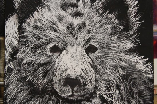 scratch art...clayboard covered with indiaink...then you scratch into the ink and get back to the white clay